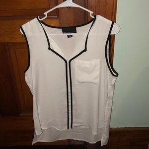 White and black blouse with a V neck like